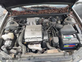 1997 Lexus ES 300 Luxury Sport Sdn with VIN JT8BF22G6V5005886, listed as a IAAI auction lot 41928969 with 264,840 mi miles. Bid and sale history available at carsss.com. Image 10.