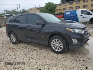 2020 Chevrolet Equinox LS z VIN 2GNAXHEV9L6232067, wystawiony jako Copart lot #59607985 z przebiegiem 66 101 mil mil oraz Szkoda całkowita • Salvage title. Historia ofert i sprzedaży dostępna na DreamBid. Obrazek 4.