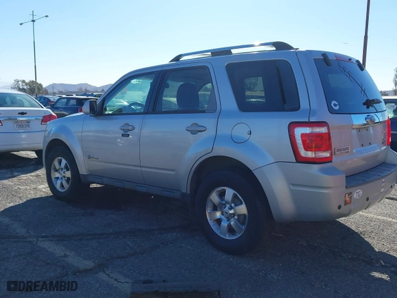 2009 Ford Escape Hybrid with VIN 1FMCU49389KA14781, listed as a IAAI auction lot 41409142 with 155,728 mi miles. Bid and sale history available at carsss.com. Image 3.