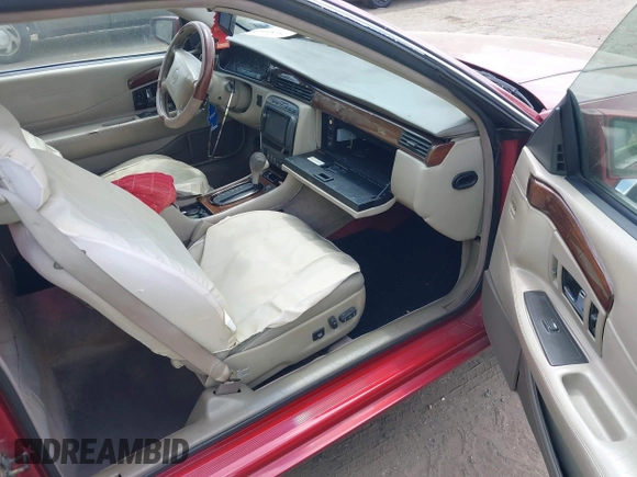 1997 Cadillac Eldorado Touring ETC z VIN 1G6ET1297VU600449, wystawiony jako IAAI lot #42096992 z przebiegiem 185 918 mil mil oraz . Historia ofert i sprzedaży dostępna na DreamBid. Obrazek 5.