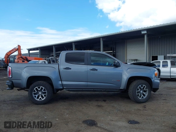 2021 GMC Canyon 4WD AT4 z VIN 1GTG6FEN8M1275345, wystawiony jako IAAI lot #42045878 z przebiegiem 68 299 mil mil oraz . Historia ofert i sprzedaży dostępna na DreamBid. Obrazek 13.