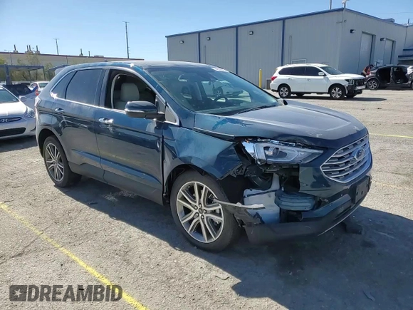 2020 Ford Edge Titanium z VIN 2FMPK4K92LBB47043, wystawiony jako Copart lot #46336085 z przebiegiem 13 733 mil mil oraz Szkoda całkowita • Salvage title. Historia ofert i sprzedaży dostępna na DreamBid. Obrazek 12.