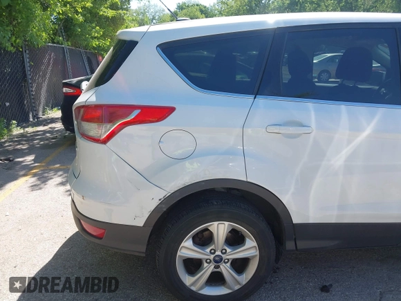 2016 Ford Escape SE z VIN 1FMCU9GX1GUC67851, wystawiony jako IAAI lot #42283011 z przebiegiem 134 458 mil mil oraz . Historia ofert i sprzedaży dostępna na DreamBid. Obrazek 6.