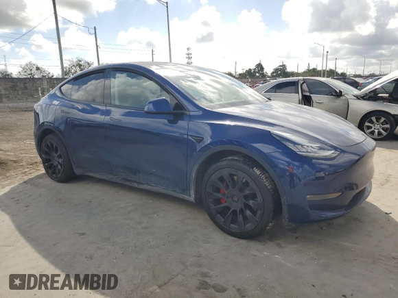 2020 Tesla Model Y Long Range with VIN 5YJYGDEE7LF038244, listed as a Copart auction lot 44153755 with 53,256 mi miles and Salvage Title. Bid and sale history available at DreamBid. Image 4.