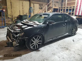 2014 Scion tC with VIN JTKJF5C7XE3071830, listed as a Copart auction lot 44690165 with 189,994 mi miles and Salvage Title. Bid and sale history available at carsss.com. Image 1.
