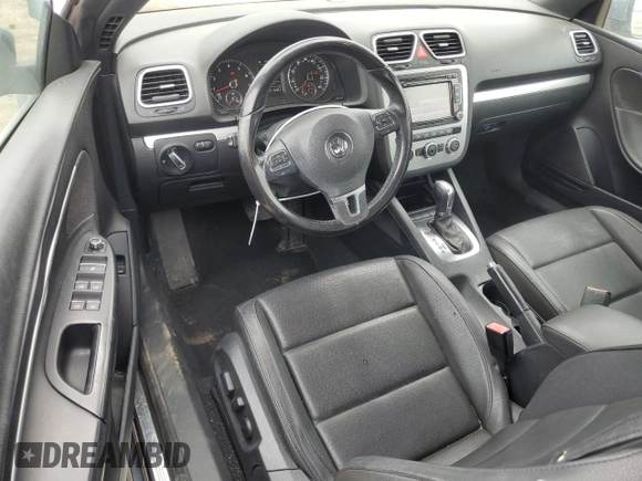 2013 Volkswagen Eos Komfort с VIN WVWBW8AH4DV001042, выставлен на аукционе Copart как лот 49492745 с пробегом 119 825 миль миль и Списание • Salvage title. История ставок и продаж доступна на DreamBid. Изображение 8.