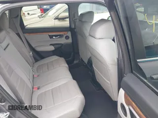 2020 Honda CR-V EX-L z VIN 2HKRW2H8XLH607574, wystawiony jako IAAI lot #42145868 z przebiegiem 46 217 mil mil oraz . Historia ofert i sprzedaży dostępna na DreamBid. Obrazek 8.
