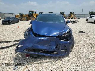 2022 Tesla Model Y Long Range z VIN 7SAYGDEE7NF313228, wystawiony jako Copart lot #55060705 z przebiegiem 32 238 mil mil oraz Szkoda całkowita • Salvage title. Historia ofert i sprzedaży dostępna na DreamBid. Obrazek 5.