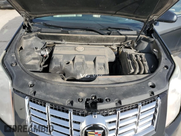2015 Cadillac SRX Luxury Collection with VIN 3GYFNEE34FS619157, listed as a Copart auction lot 48331665 with 130,477 mi miles and Salvage Title. Bid and sale history available at DreamBid. Image 12.