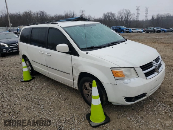 2010 Dodge Grand Caravan SXT with VIN 2D4RN5D12AR244722, listed as a Copart auction lot 43725005 with 210,546 mi miles and Clean Title. Bid and sale history available at DreamBid. Image 4.