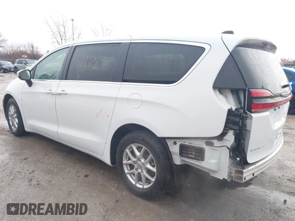 2023 Chrysler Pacifica Touring L with VIN 2C4RC1BG6PR520945, listed as a IAAI auction lot 41591128 with 70,351 mi miles and . Bid and sale history available at DreamBid. Image 3.