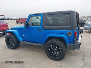 2014 Jeep Wrangler Arctic z VIN 1C4GJWBG3EL313350, wystawiony jako IAAI lot #41442520 z przebiegiem Nie podano mil oraz . Historia ofert i sprzedaży dostępna na DreamBid. Obrazek 14.