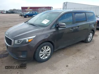 2015 Kia Sedona LX with VIN KNDMB5C13F6072586, listed as a IAAI auction lot 42090232 with 125,818 mi miles. Bid and sale history available at carsss.com. Image 2.