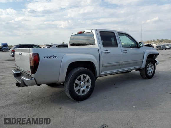 2012 GMC Canyon SLE1 with VIN 1GTH5MFE8C8156663, listed as a Copart auction lot 77385804 with 196,437 mi miles and Salvage Title. Bid and sale history available at carsss.com. Image 3.