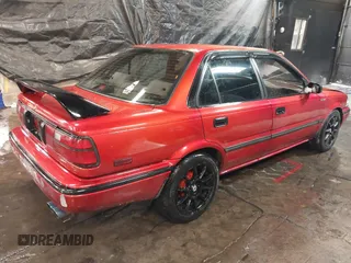 1991 Toyota Corolla with VIN 2T1AE94A4MC063109, listed as a IAAI auction lot 41357536 with 81,958 mi miles and . Bid and sale history available at DreamBid. Image 4.
