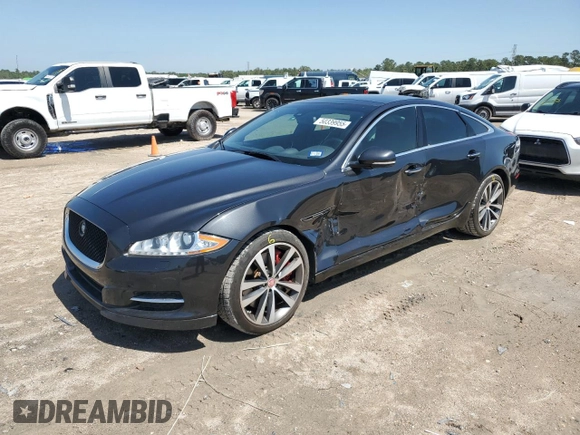 2013 Jaguar XJ with VIN SAJWA3HE9DMV49768, listed as a Copart auction lot 50339955 with 56,841 mi miles and Salvage Title. Bid and sale history available at DreamBid. Image 1.