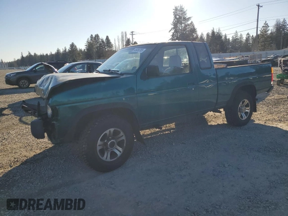 1996 Nissan Frontier XE with VIN 1N6SD16Y9TC338402, listed as a Copart auction lot 45058765 with 164,295 mi miles and Salvage title. Bid and sale history available at DreamBid. Image 1.