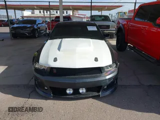 2011 Ford Mustang GT with VIN 1ZVBP8CF0B5107488, listed as a IAAI auction lot 42078619 with 148,171 mi miles. Bid and sale history available at carsss.com. Image 12.