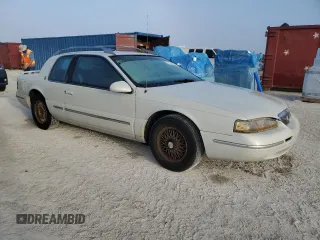 1997 Mercury Cougar z VIN 1MELM62W0VH602622, wystawiony jako Copart lot #77042354 z przebiegiem 122 027 mil mil oraz Nie do naprawy. Historia ofert i sprzedaży dostępna na DreamBid. Obrazek 4.