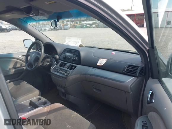 2010 Honda Odyssey EX with VIN 5FNRL3H43AB025629, listed as a IAAI auction lot 42095744 with 209,722 mi miles and . Bid and sale history available at DreamBid. Image 5.
