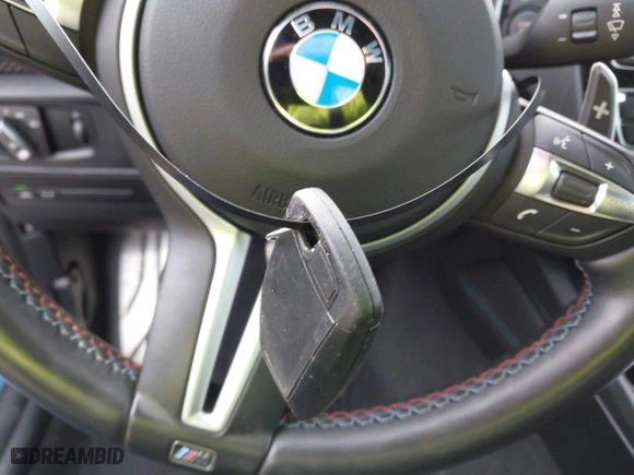 2017 BMW M2 with VIN WBS1H9C57HV886785, listed as a IAAI auction lot 41716752 with 63,388 mi miles. Bid and sale history available at carsss.com. Image 11.