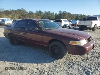 2006 Ford Police Interceptor with VIN 2FAFP71W06X165970, listed as a Copart auction lot 76293344 with 180,661 mi miles and Salvage title. Bid and sale history available at DreamBid. Image 4.