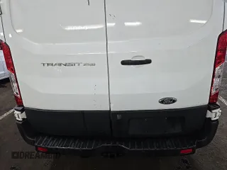 2015 Ford Transit Cargo with VIN 1FTNR1ZM9FKA60864, listed as a IAAI auction lot 42685568 with 154,262 mi miles and . Bid and sale history available at DreamBid. Image 32.
