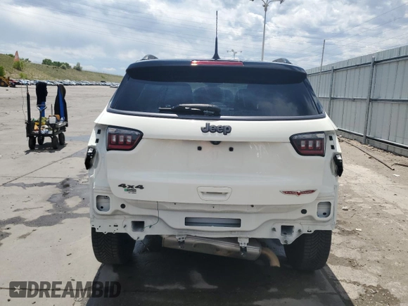 2020 Jeep Compass Trailhawk with VIN 3C4NJDDB1LT189240, listed as a Copart auction lot 57876235 with 70,309 mi miles and Salvage title. Bid and sale history available at DreamBid. Image 6.