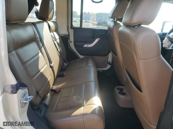 2011 Jeep Wrangler Unlimited Sahara with VIN 1J4BA5H10BL558961, listed as a Copart auction lot 74806494 with 172,855 mi miles and Salvage Title. Bid and sale history available at carsss.com. Image 11.