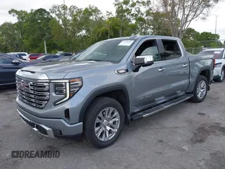 2023 GMC Sierra 1500 with VIN 3GTPHGE86PG352567, listed as a IAAI auction lot 41705291 with 14,800 mi miles and . Bid and sale history available at DreamBid. Image 18.