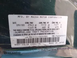 2001 Mazda MX-5 Miata with VIN JM1NB353410203981, listed as a IAAI auction lot 42028077 with Not Provided miles and . Bid and sale history available at DreamBid. Image 9.