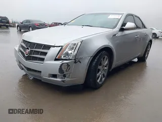 2009 Cadillac CTS RWD w/1SB with VIN 1G6DV57V090157738, listed as a IAAI auction lot 41180254 with 129,361 mi miles. Bid and sale history available at carsss.com. Image 2.