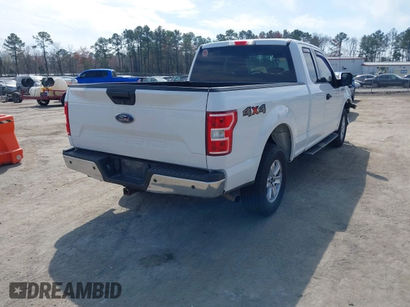 2018 Ford F-150 XL with VIN 1FTEX1EB4JFA77373, listed as a IAAI auction lot 41813197 with 235,251 mi miles and . Bid and sale history available at DreamBid. Image 4.
