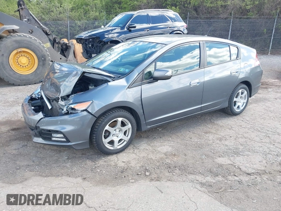 2013 Honda Insight EX z VIN JHMZE2H71DS004170, wystawiony jako IAAI lot #41971733 z przebiegiem 174 000 mil mil oraz . Historia ofert i sprzedaży dostępna na DreamBid. Obrazek 2.