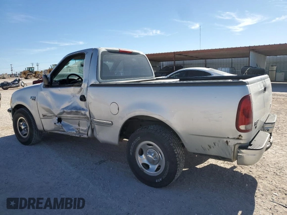 1998 Ford F-150 z VIN 1FTZF1762WKA87421, wystawiony jako Copart lot #86973334 z przebiegiem 217 978 mil mil oraz Szkoda całkowita • Salvage title. Historia ofert i sprzedaży dostępna na DreamBid. Obrazek 2.