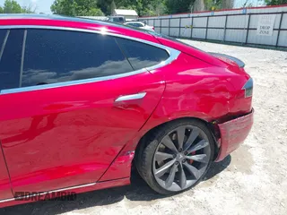 2016 Tesla Model S 90D with VIN 5YJSA1E48GF144821, listed as a IAAI auction lot 42206473 with 129,624 mi miles and . Bid and sale history available at DreamBid. Image 6.