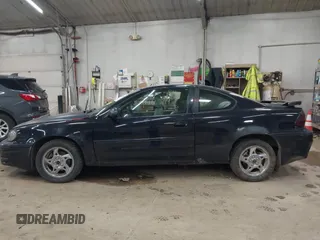 2005 Pontiac Grand Am GT with VIN 1G2NW12E85M140434, listed as a IAAI auction lot 41966294 with 142,548 mi miles. Bid and sale history available at carsss.com. Image 14.