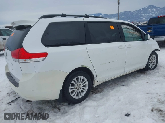 2014 Toyota Sienna XLE with VIN 5TDYK3DC9ES442525, listed as a IAAI auction lot 41502770 with Not provided miles and . Bid and sale history available at DreamBid. Image 4.