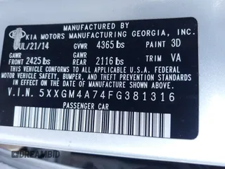 2015 Kia Optima LX with VIN 5XXGM4A74FG381316, listed as a IAAI auction lot 41885940 with 128,984 mi miles. Bid and sale history available at carsss.com. Image 9.