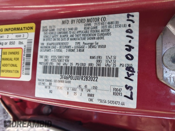 2015 Ford Fusion SE Hybrid with VIN 3FA6P0LUXFR282022, listed as a IAAI auction lot 41652820 with 210,865 mi miles. Bid and sale history available at carsss.com. Image 9.