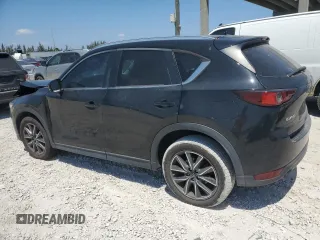 2018 Mazda CX-5 Touring with VIN JM3KFACM2J1327725, listed as a Copart auction lot 54894765 with 56,194 mi miles and Salvage Title. Bid and sale history available at carsss.com. Image 2.