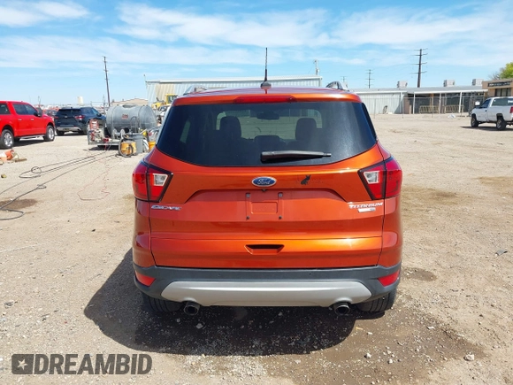 2019 Ford Escape Titanium with VIN 1FMCU9J92KUB28895, listed as a IAAI auction lot 42065235 with 112,305 mi miles and . Bid and sale history available at DreamBid. Image 16.