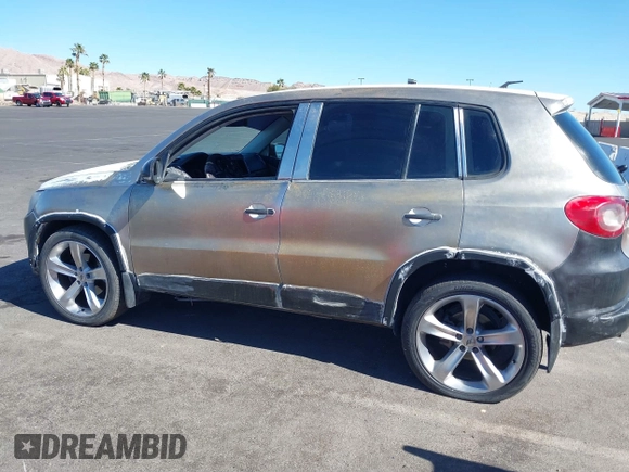 2010 Volkswagen Tiguan with VIN WVGAV9AX1AW513306, listed as a IAAI auction lot 41626072 with 162,086 mi miles and . Bid and sale history available at DreamBid. Image 12.