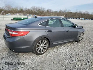 2013 Hyundai Azera with VIN KMHFH4JG4DA317104, listed as a Copart auction lot 52909875 with 125,485 mi miles and Salvage Title. Bid and sale history available at DreamBid. Image 3.