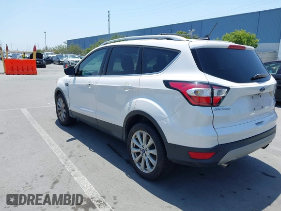 2018 Ford Escape Titanium with VIN 1FMCU0J94JUB26110, listed as a IAAI auction lot 42436285 with 59,586 mi miles and . Bid and sale history available at DreamBid. Image 3.