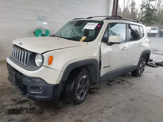 2015 Jeep Renegade Latitude with VIN ZACCJBBH7FPB51994, listed as a IAAI auction lot 41658051 with 95,580 mi miles. Bid and sale history available at carsss.com. Image 2.