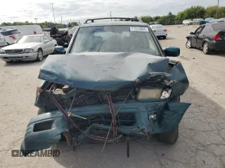 1998 Isuzu Rodeo S with VIN 4S2CM58W8W4368553, listed as a Copart auction lot 71313904 with 183,059 mi miles and Salvage title. Bid and sale history available at DreamBid. Image 5.