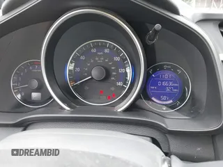 2016 Honda Fit EX z VIN JHMGK5H70GX046385, wystawiony jako IAAI lot #42014521 z przebiegiem 16 636 mil mil oraz . Historia ofert i sprzedaży dostępna na DreamBid. Obrazek 7.