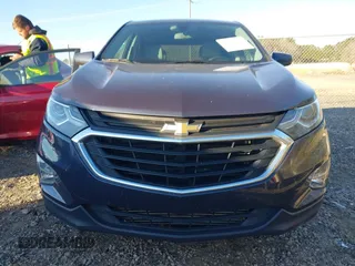 2019 Chevrolet Equinox LT z VIN 3GNAXKEVXKL243487, wystawiony jako IAAI lot #41217077 z przebiegiem 62 119 mil mil oraz . Historia ofert i sprzedaży dostępna na DreamBid. Obrazek 13.