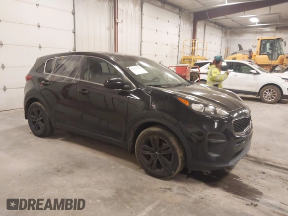 2018 Kia Sportage LX with VIN KNDPM3AC6J7417371, listed as a IAAI auction lot 41879390 with 112,944 mi miles and . Bid and sale history available at carsss.com. Image 1.